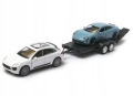 imgi_21_Porsche-Macan-Taycan-laweta-1-34-39-Stan-opakowania-oryginalne.jpg