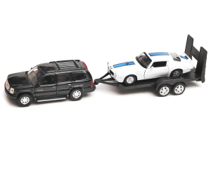 Cadillac Escalade i Pontiac Firebird Trans AM laweta 1:34-39 model WELLY